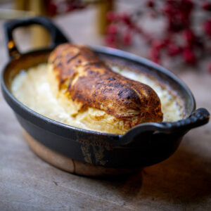 Deux quenelles de brochet frais, sauce béchamel aux champignons