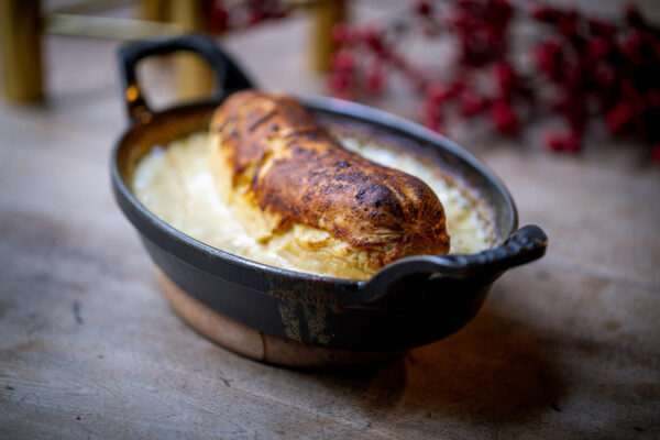 Deux quenelles de brochet frais, sauce béchamel aux champignons